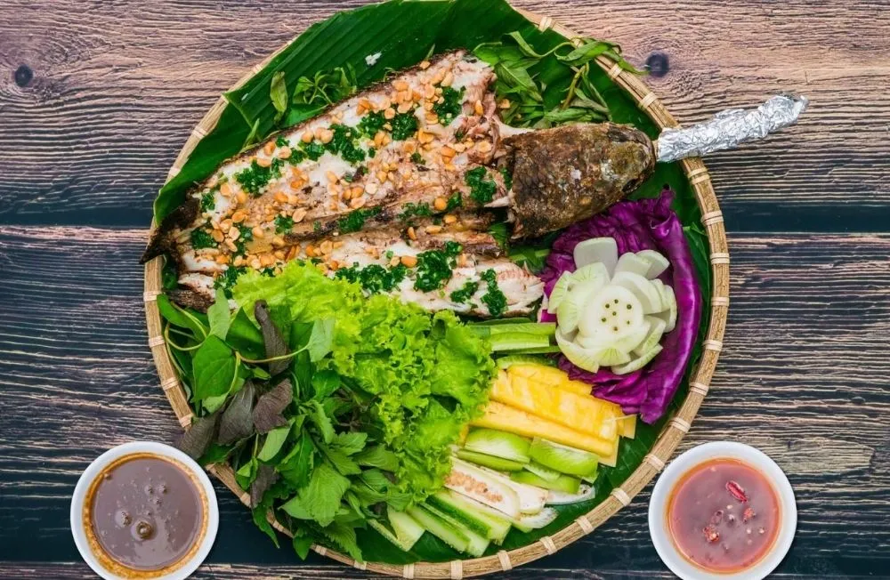Cá lóc nướng trui  Món ăn đậm chất khẩn hoang của miền sông nước Nam Bộ
